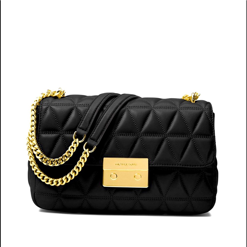 Small size purse, golden chain handle, this one is a bit more used.